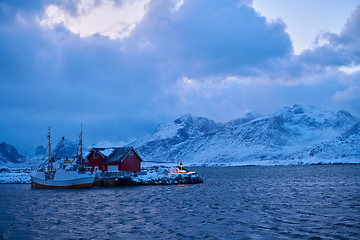 Image showing Traditional Norwegian fisherman\'s cabins and boats