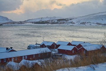 Image showing Traditional Norwegian fisherman\'s cabins and boats