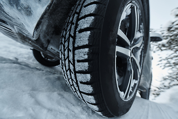 Image showing offroad suv car on icy winter north road