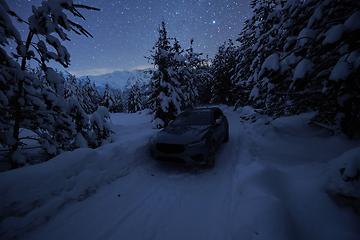 Image showing offroad suv car on icy winter north road