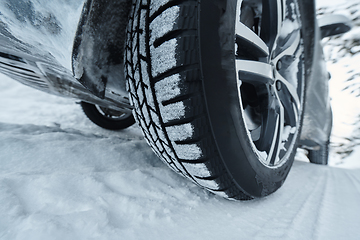 Image showing offroad suv car on icy winter north road