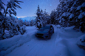 Image showing offroad suv car on icy winter north road