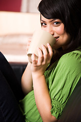 Image showing Asian girl with coffee cup