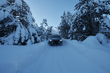 Image showing offroad suv car on icy winter north road