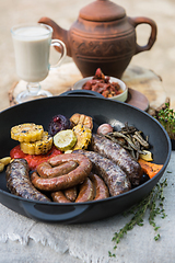 Image showing Grilled sausages with vegetables