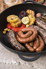 Image showing Grilled sausages with vegetables