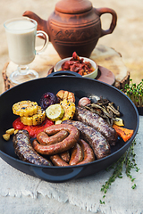 Image showing Grilled sausages with vegetables