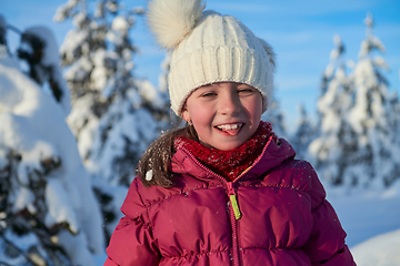 Image showing cute little girl on beautiful winter day