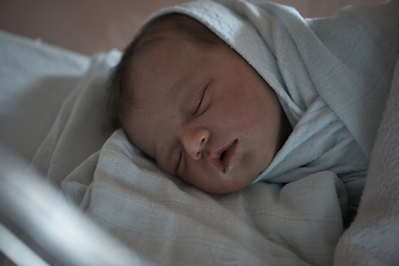 Image showing newborn baby sleeping in bed at hospital