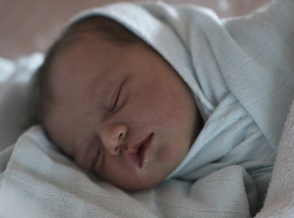 Image showing newborn baby sleeping in bed at hospital