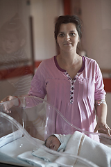 Image showing newborn baby and mother in hospital