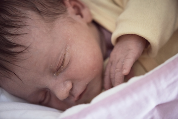 Image showing newborn baby sleeping in bed at hospital