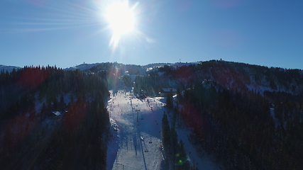 Image showing sunny winter day with fresh snow in ski resort