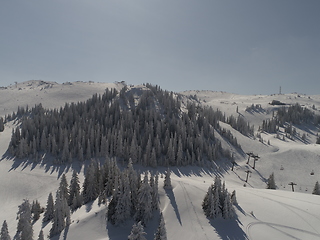 Image showing sunny winter day with fresh snow in ski resort