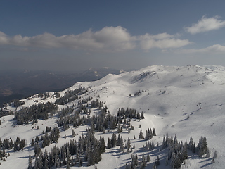 Image showing sunny winter day with fresh snow in ski resort