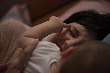 Image showing mother is playing with baby at home