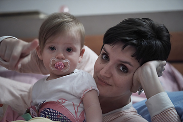 Image showing mother is playing with baby at home