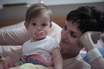 Image showing mother is playing with baby at home