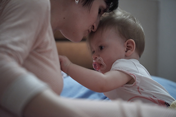 Image showing mother is playing with baby at home