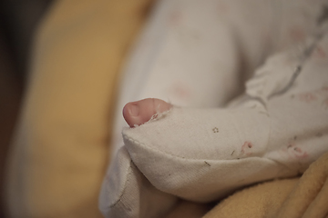 Image showing One month newborn baby sleeping in bed