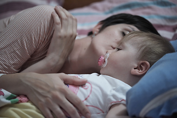 Image showing mother is playing with baby at home