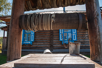 Image showing Wooden retro well in garden