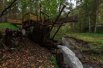 Image showing Rustic watermill with wheel