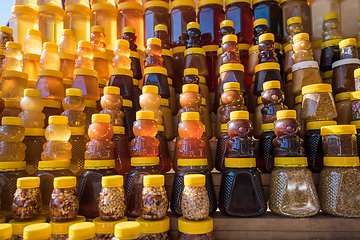 Image showing A lot of jars with natural organic honey