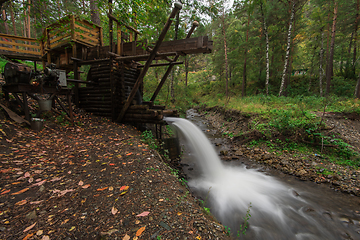 Image showing Rustic watermill with wheel