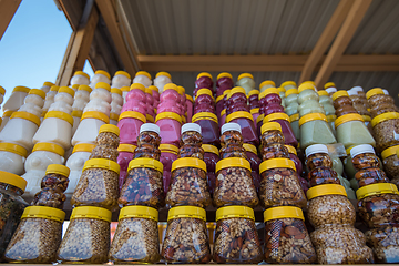 Image showing A lot of jars with natural organic honey