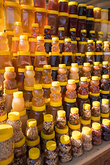 Image showing A lot of jars with natural organic honey