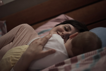 Image showing mother is playing with baby at home