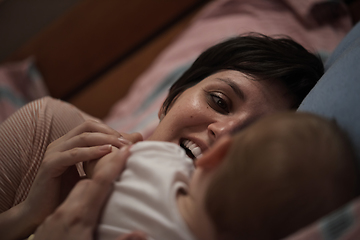 Image showing mother is playing with baby at home