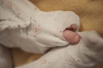 Image showing One month newborn baby sleeping in bed