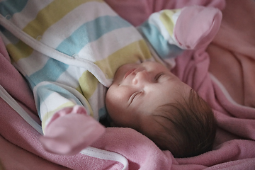 Image showing newborn baby sleeping at home in bed