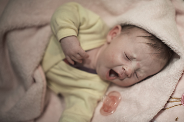 Image showing newborn baby sleeping at home in bed