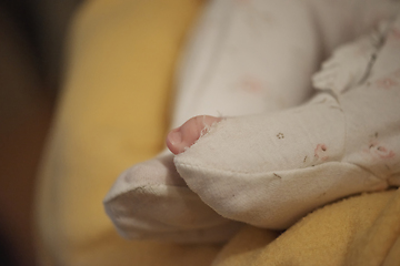 Image showing One month newborn baby sleeping in bed