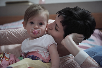 Image showing mother is playing with baby at home