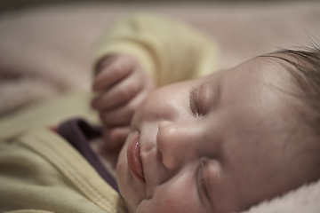 Image showing newborn baby sleeping at home in bed