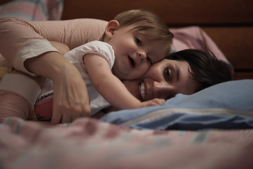 Image showing mother is playing with baby at home