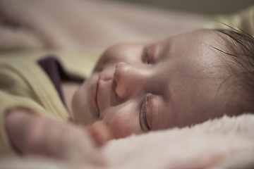 Image showing newborn baby sleeping at home in bed