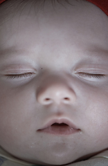 Image showing newborn baby sleeping at home in bed