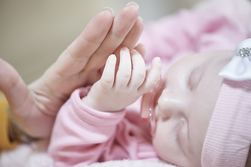 Image showing mother is playing with baby at home