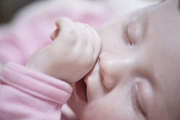 Image showing newborn baby sleeping at home in bed