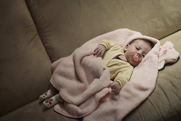 Image showing newborn baby sleeping at home in bed