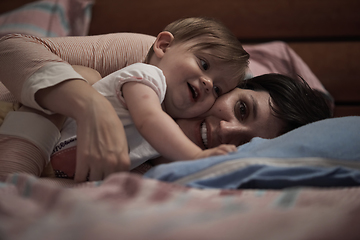 Image showing mother is playing with baby at home