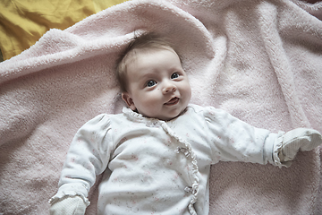 Image showing happy newborn little baby smilling