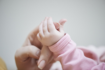 Image showing mother is playing with baby at home