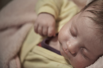 Image showing newborn baby sleeping at home in bed