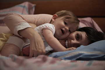 Image showing mother is playing with baby at home